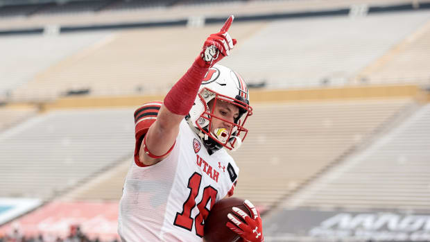 Dec 12, 2020; Boulder, Colorado, USA; Utah Utes wide receiver Britain Covey (18) celebrates after scoring a touchdown against the Colorado Buffaloes in the third quarter at Folsom Field.