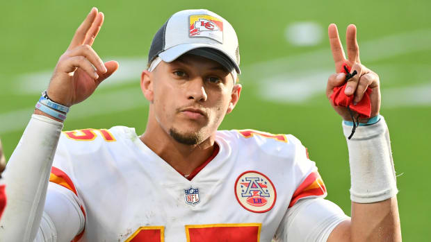 Dec 13, 2020; Miami Gardens, Florida, USA; Kansas City Chiefs quarterback Patrick Mahomes (15) celebrates after defeat the Miami Dolphins at Hard Rock Stadium. Mandatory Credit: Jasen Vinlove-USA TODAY Sports