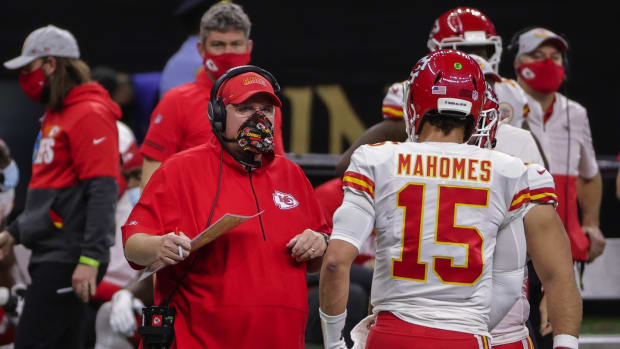Dec 20, 2020; New Orleans, Louisiana, USA; Kansas City Chiefs head coach Andy Reid talks with quarterback Patrick Mahomes (15) during the first half against the New Orleans Saints at the Mercedes-Benz Superdome. Mandatory Credit: Derick E. Hingle-USA TODAY Sports