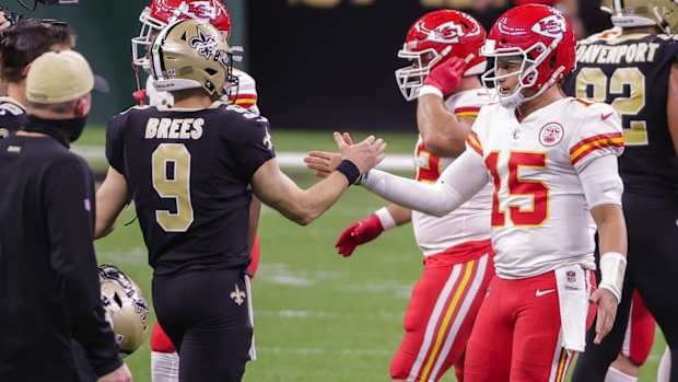 Dec 20, 2020; New Orleans, Louisiana, USA; New Orleans Saints quarterback Drew Brees (9) and Kansas City Chiefs quarterback Patrick Mahomes (15) talk following the game at the Mercedes-Benz Superdome. Mandatory Credit: Derick E. Hingle-USA TODAY Sports