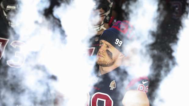 Dec 27, 2020; Houston, Texas, USA; Houston Texans defensive end J.J. Watt (99) waits with teammates to walk onto the field before a game against the Cincinnati Bengals at NRG Stadium. Mandatory Credit: Troy Taormina-USA TODAY Sports