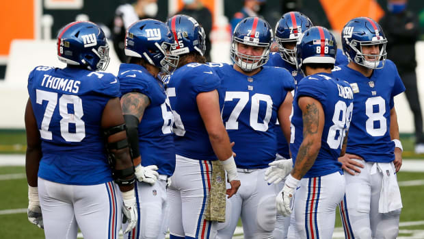 New York Giants offensive guard Kevin Zeitler (70) talks n the huddle before a play in the second quarter of the NFL Week 12 game between the Cincinnati Bengals and the New York Giants at Paul Brown Stadium in Cincinnati on Sunday, Nov. 29, 2020. The game was tied at 10 going into halftime.
