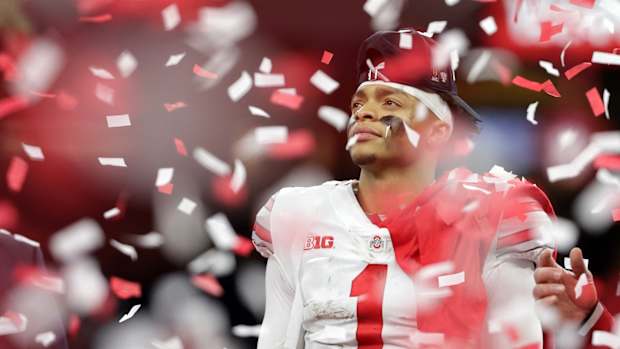 Jan 1, 2021; New Orleans, LA, USA; Ohio State Buckeyes quarterback Justin Fields (1) celebrates after defeating the Clemson Tigers at Mercedes-Benz Superdome. Mandatory Credit: Derick E. Hingle-USA TODAY Sports