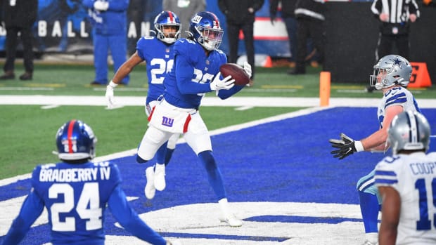 Jan 3, 2021; East Rutherford, NJ, USA; New York Giants safety Xavier McKinney (29) intercepts a pass in the end zone intended for Dallas Cowboys tight end Dalton Schultz (86) in the second half at MetLife Stadium.