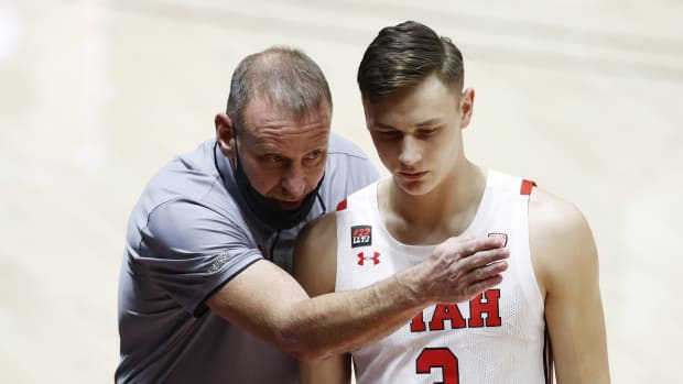 Jan 11, 2021; Salt Lake City, Utah, USA; Utah Utes head coach Larry Krystkowiak instructs guard Pelle Larsson (3) in the first half against the Colorado Buffaloes at Jon M. Huntsman Center.