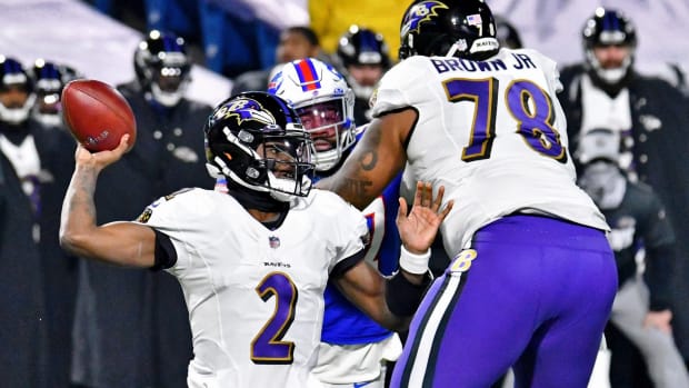 Jan 16, 2021; Orchard Park, New York, USA; Baltimore Ravens quarterback Tyler Huntley (2) throws the ball against the Buffalo Bills during the second half of an AFC Divisional Round playoff game at Bills Stadium. The Buffalo Bills won 17-3.