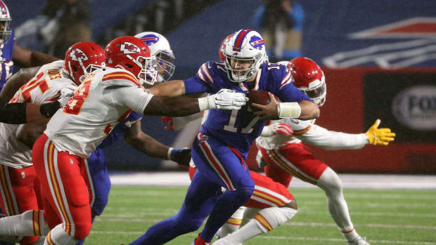 Josh Allen runs from Kansas City defenders during the Chiefs' 26-17 win against the Buffalo Bills at Bills Stadium on Oct. 19, 2020. Jg 101920 Bills 5 © Jamie Germano/Rochester Democrat and Chronicle via Imagn Content Services, LLC