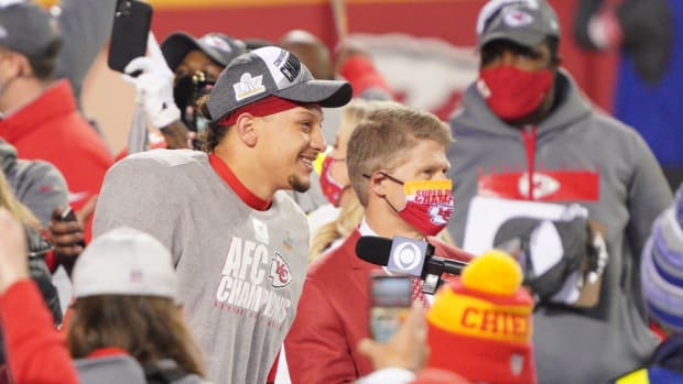 Jan 24, 2021; Kansas City, MO, USA; Kansas City Chiefs quarterback Patrick Mahomes (15) and team owner Clark Hunt are interviewed after defeating the Buffalo Bills in the AFC Championship Game at Arrowhead Stadium. Mandatory Credit: Denny Medley-USA TODAY Sports