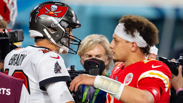 Feb 7, 2021; Tampa, FL, USA; Tampa Bay Buccaneers quarterback Tom Brady (left) greets Kansas City Chiefs quarterback Patrick Mahomes following Super Bowl LV at Raymond James Stadium. Mandatory Credit: Mark J. Rebilas-USA TODAY Sports