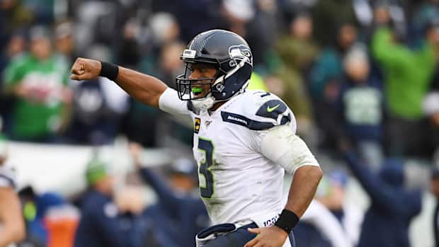 Russell Wilson pumps his first after a pass