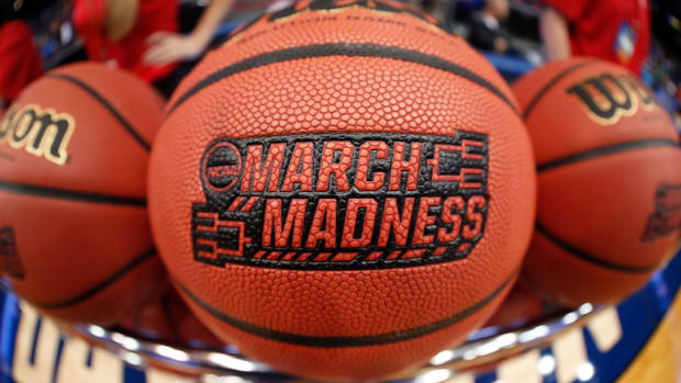 March Madness logo on a basketball