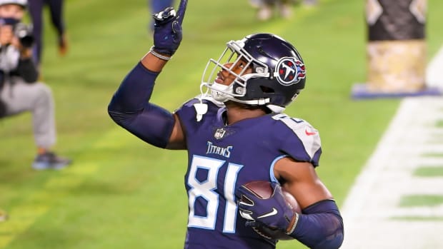 Nov 12, 2020; Nashville, Tennessee, USA; Tennessee Titans tight end Jonnu Smith (81) points to the sky after scoring a touchdown against the Indianapolis Colts during the first half at Nissan Stadium. Mandatory Credit: Steve Roberts-USA TODAY Sports