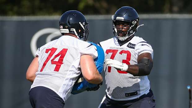 Jul 25, 2019; Houston, TX, USA; Houston Texans offensive guard Zach Fulton (73) and offensive tackle Max Scharping (74) during training camp at Houston Methodist Training Center.