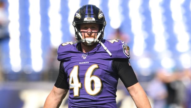 Baltimore Ravens long snapper Morgan Cox (46) looks on before a football game against the Cleveland Browns at M&T Bank Stadium.