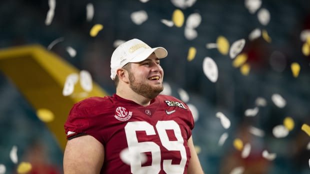 Jan 11, 2021; Miami Gardens, Florida, USA; Alabama Crimson Tide offensive lineman Landon Dickerson (69) celebrates after beating the Ohio State Buckeyes in the 2021 College Football Playoff National Championship Game. Mandatory Credit: Mark J. Rebilas-USA TODAY Sports