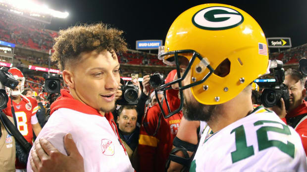 Oct 27, 2019; Kansas City, MO, USA; Green Bay Packers quarterback Aaron Rodgers (12) talks with Kansas City Chiefs quarterback Patrick Mahomes (15) after the game at Arrowhead Stadium. Mandatory Credit: Jay Biggerstaff-USA TODAY Sports