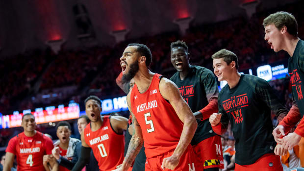 Maryland Terrapins guard Eric Ayala (5) celebrates a foul after making a layup during the second half against the Illinois Fighting Illini at State Farm Center.