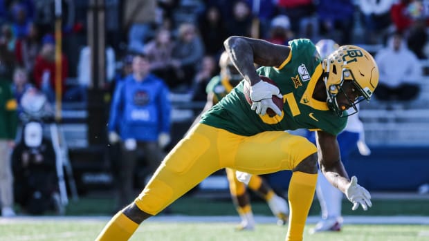 Nov 30, 2019; Lawrence, KS, USA; Baylor Bears wide receiver Denzel Mims (5) catches a pass against the Kansas Jayhawks during the first half at David Booth Kansas Memorial Stadium.