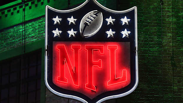Apr 25, 2019; Nashville, TN, USA; Detailed view of neon NFL shield logo during the first round of the 2019 NFL Draft in downtown Nashville.