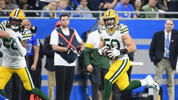 Dec 29, 2019; Detroit, Michigan, USA; Green Bay Packers inside linebacker Blake Martinez (50) runs the ball after an interception during the fourth quarter against the Detroit Lions at Ford Field. Mandatory Credit: Tim Fuller-USA TODAY Sports