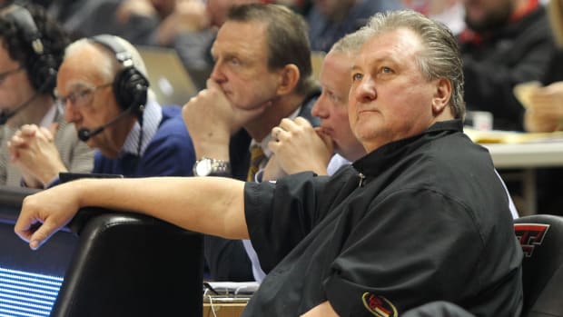West Virginia Mountaineers head coach Bob Huggins looks on before the game against the Texas Tech Red Raiders at United Supermarkets Arena.