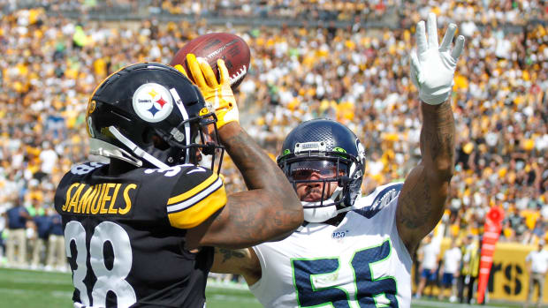 Seattle Seahawks linebacker Mychal Kendricks (56) committs pass interference against Pittsburgh Steelers running back Jaylen Samuels (38) during the second quarter at Heinz Field.