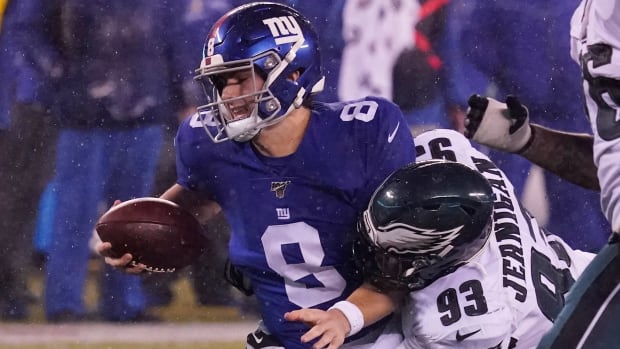 Dec 29, 2019; East Rutherford, New Jersey, USA; Philadelphia Eagles defensive tackle Timmy Jernigan (93) sacks New York Giants quarterback Daniel Jones (8) in the second half at MetLife Stadium.