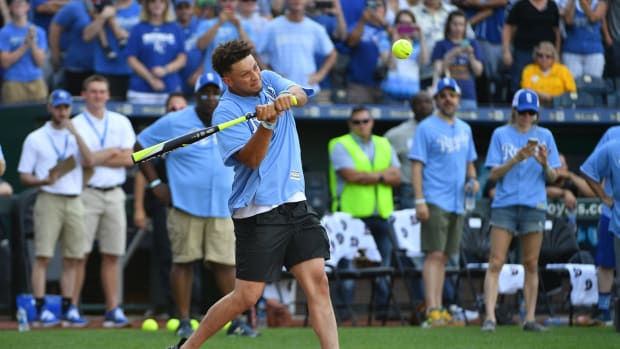 Jun 7, 2019; Kansas City, MO, USA; Kansas City Chiefs quarterback Patrick Mahomes hits a home run during the Big Slick celebrity softball game at Kauffman Stadium. Mandatory Credit: Denny Medley-USA TODAY Sports