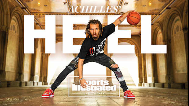 Cole Anthony dribbles