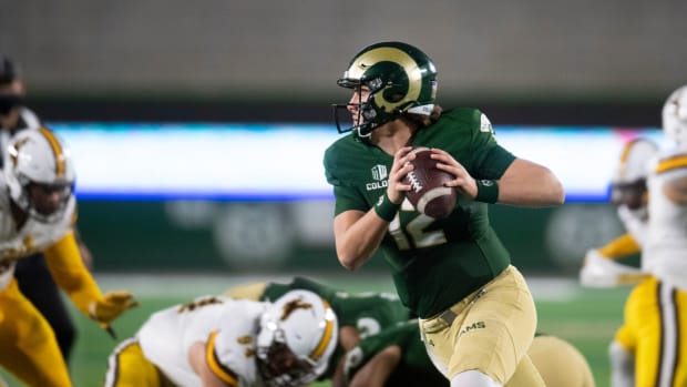 Colorado State Rams quarterback Patrick O'Brien (12) looks to make a pass in the first quarter of the game against the Wyoming Cowboys at Colorado State University in Fort Collins, Colo. on Thursday, Nov. 5, 2020 at Canvas Stadium.

110520 Csuvwyfb 08 Bb