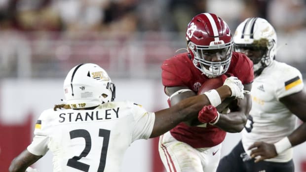 Sep 25, 2021; Tuscaloosa, Alabama, USA; Alabama Crimson Tide running back Roydell Williams (23) runs the ball against Southern Miss Golden Eagles defensive back Jay Stanley (21) at Bryant-Denny Stadium. Alabama won 63-14. Mandatory Credit: Gary Cosby-USA TODAY Sports