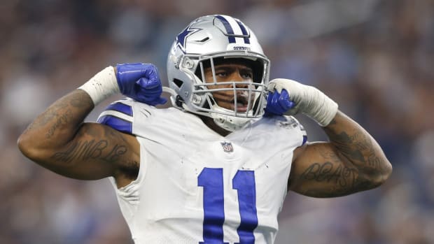 Oct 3, 2021; Arlington, Texas, USA; Dallas Cowboys linebacker Micah Parsons (11) reacts after a sack in the fourth quarter against the Carolina Panthers at AT&T Stadium.