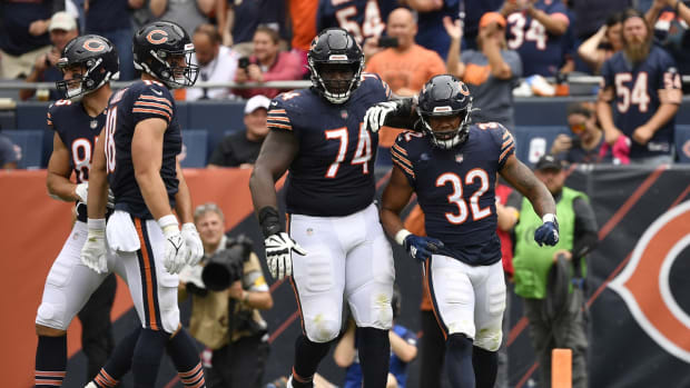Oct 3, 2021; Chicago, Illinois, USA; Chicago Bears running back David Montgomery (32) reacts after scoring a touchdown in the first half against the Detroit Lions at Soldier Field. Mandatory Credit: Quinn Harris-USA TODAY Sports