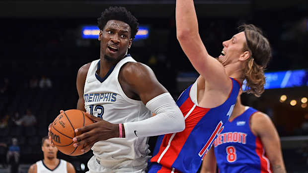 Memphis's Jaren Jackson Jr. tries to get past Kelly Olynyk