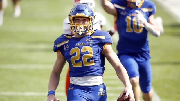 May 16, 2021; Frisco, Texas, USA; South Dakota State Jackrabbits running back Isaiah Davis (22) runs for a touchdown during the fourth quarter against the Sam Houston State Bearkats during the Division I FCS Championship football game at Toyota Stadium. Mandatory Credit: Tim Heitman-USA TODAY Sports