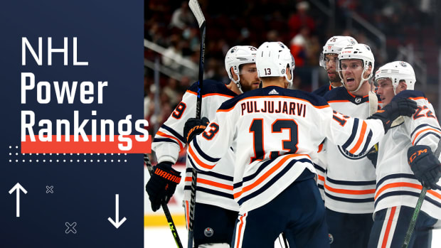 Connor McDavid celebrates a goal with his Oilers teammates.
