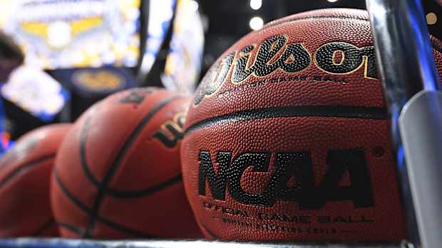College basketballs sit at the SEC tournament