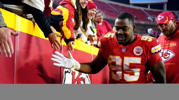Nov 1, 2021; Kansas City, Missouri, USA; Kansas City Chiefs defensive end Chris Jones (95) celebrates with fans in the stands after defeating the New York Giants at GEHA Field at Arrowhead Stadium. Mandatory Credit: Jay Biggerstaff-USA TODAY Sports