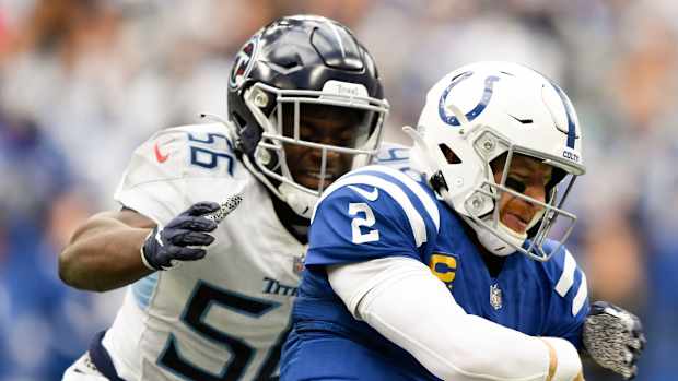 Tennessee Titans linebacker Monty Rice (56) stops Indianapolis Colts quarterback Carson Wentz (2) during overtime at Lucas Oil Stadium Sunday, Oct. 31, 2021 in Indianapolis, Ind.

Titans Colts 154