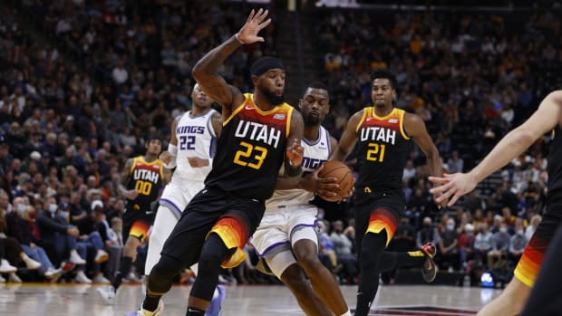 Nov 2, 2021; Salt Lake City, Utah, USA; Utah Jazz forward Royce O'Neale (23) and Sacramento Kings forward Harrison Barnes (40) battle in the second quarter at Vivint Arena. Mandatory Credit: Jeffrey Swinger-USA TODAY Sports