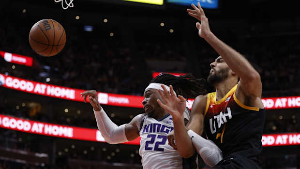 Nov 2, 2021; Salt Lake City, Utah, USA; Sacramento Kings center Richaun Holmes (22) and Utah Jazz center Rudy Gobert (27) battle at Vivint Arena. Mandatory Credit: Jeffrey Swinger-USA TODAY Sports