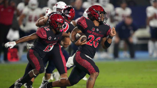 Oct 30, 2021; Carson, California, USA; San Diego State Aztecs running back Kaegun Williams (26) carries the ball on a kickoff return against the Fresno State Bulldogs in the second half at Dignity Health Sports Park. Mandatory Credit: Kirby Lee-USA TODAY Sports