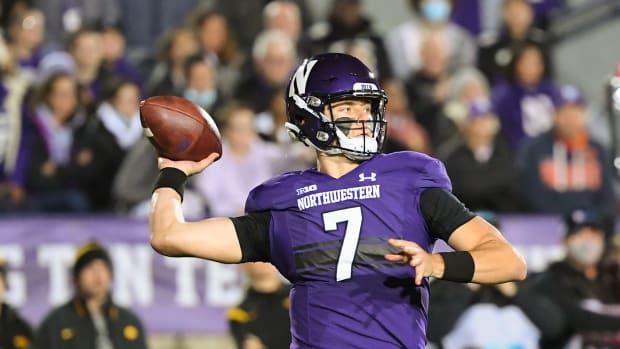 Nov 6, 2021; Evanston, Illinois, USA; Northwestern Wildcats quarterback Andrew Marty (7) passes the football in the first half against the Iowa Hawkeyes at Ryan Field. Mandatory Credit: Quinn Harris-USA TODAY Sports