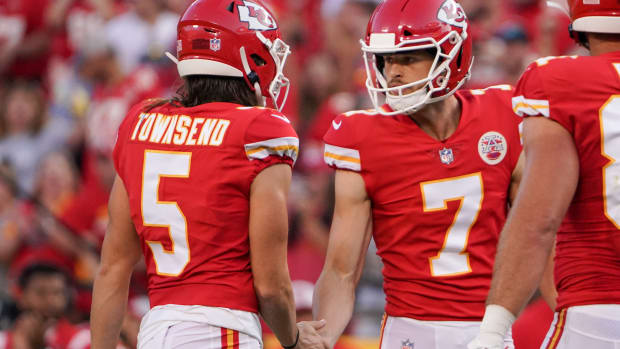 Aug 27, 2021; Kansas City, Missouri, USA; Kansas City Chiefs kicker Harrison Butker (7) celebrates with punter Tommy Townsend (5) after kicking the point after touchdown against the Minnesota Vikings during the first quarter at GEHA Field at Arrowhead Stadium. Mandatory Credit: Denny Medley-USA TODAY Sports