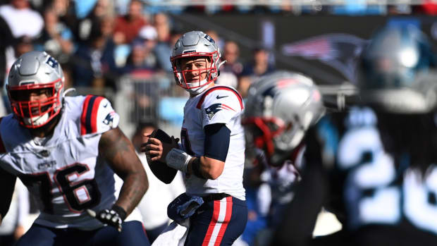 Nov 7, 2021; Charlotte, North Carolina, USA; New England Patriots quarterback Mac Jones (10) looks to pass in the second quarter at Bank of America Stadium. Mandatory Credit: Bob Donnan-USA TODAY Sports