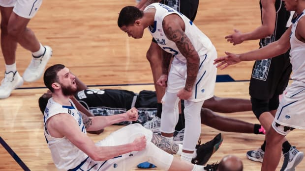 Mar 12, 2021; New York, NY, USA; Seton Hall Pirates forward Sandro Mamukelashvili (23) celebrates with guard Shavar Reynolds (33) after making a basket against the Georgetown Hoyas during the second half at Madison Square Garden. Mandatory Credit: Vincent Carchietta-USA TODAY Sports