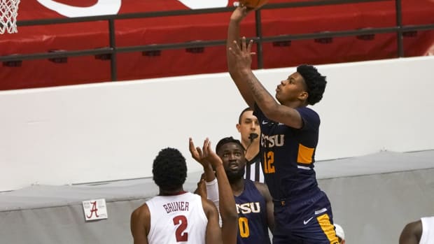 Dec 22, 2020; Tuscaloosa, Alabama, USA; East Tennessee State Buccaneers forward Damari Monsanto (12) shoots against the Alabama Crimson Tide during the second half at Coleman Coliseum. Mandatory Credit: Marvin Gentry-USA TODAY Sports