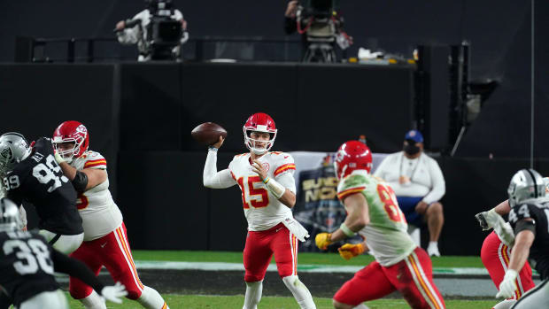 Nov 22, 2020; Paradise, Nevada, USA; Kansas City Chiefs quarterback Patrick Mahomes (15) throws against the Las Vegas Raiders during the second half at Allegiant Stadium. Mandatory Credit: Kirby Lee-USA TODAY Sports