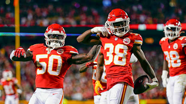 Nov 7, 2021; Kansas City, Missouri, USA; Kansas City Chiefs cornerback L'Jarius Sneed (38) celebrates with teammates after intercepting a pass against the Green Bay Packers during the second half at GEHA Field at Arrowhead Stadium. Mandatory Credit: Jay Biggerstaff-USA TODAY Sports
