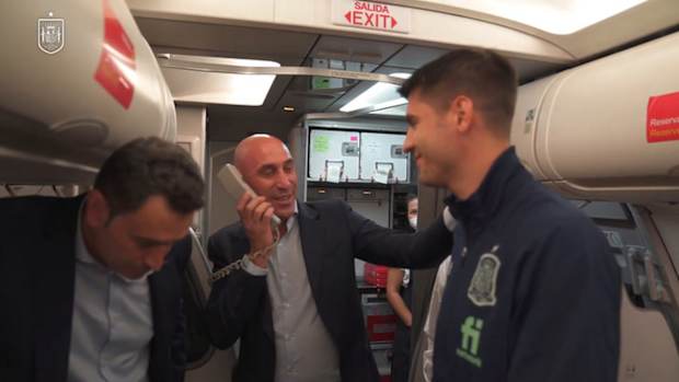 Morata celebrates 50th game for Spain during flight